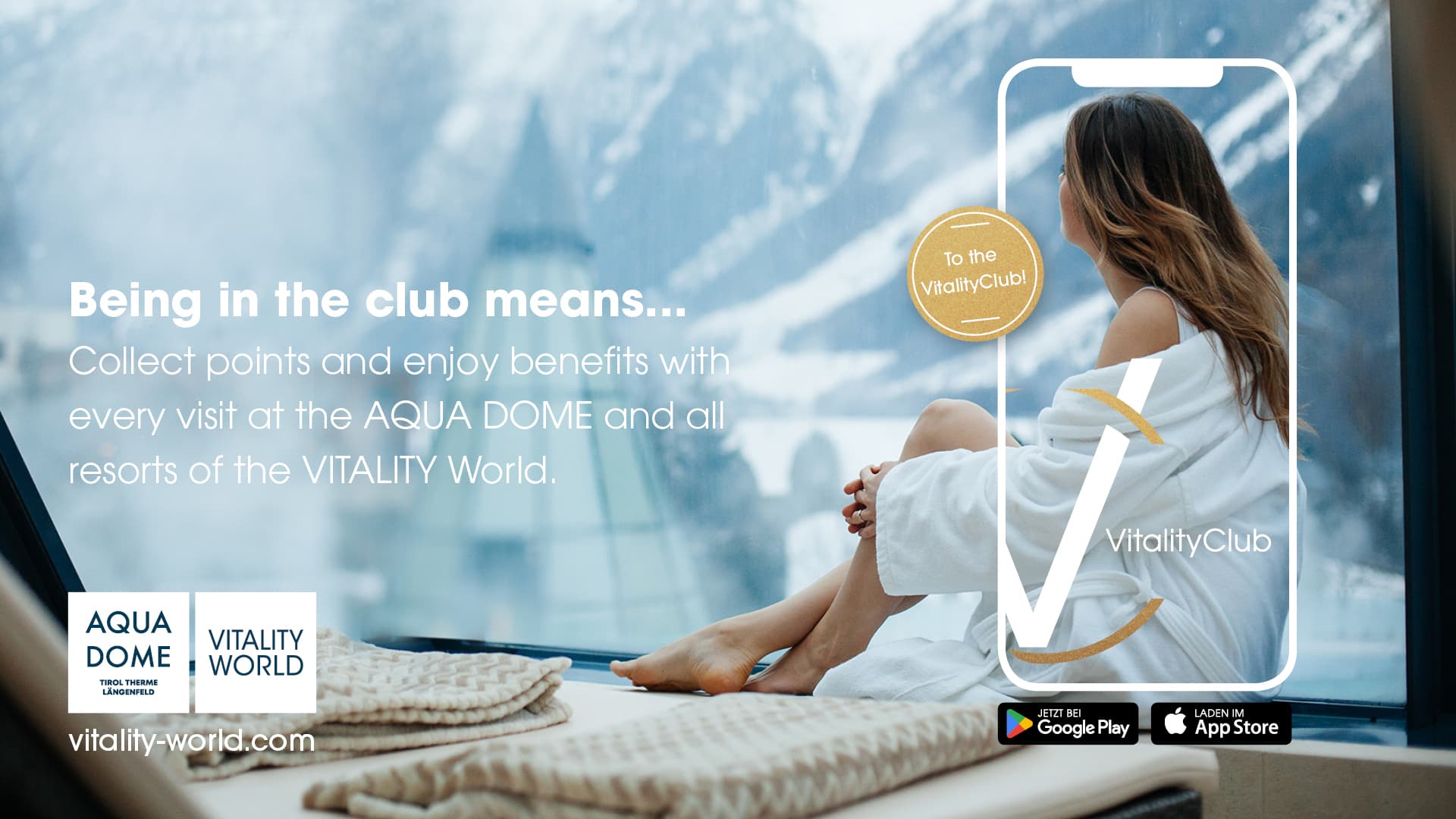 A woman in a white bathrobe sits by a snowy window, overlaid with a Vamed smartphone graphic promoting the VitalityClub app, Aqua Dome, and Vitality World rewards.