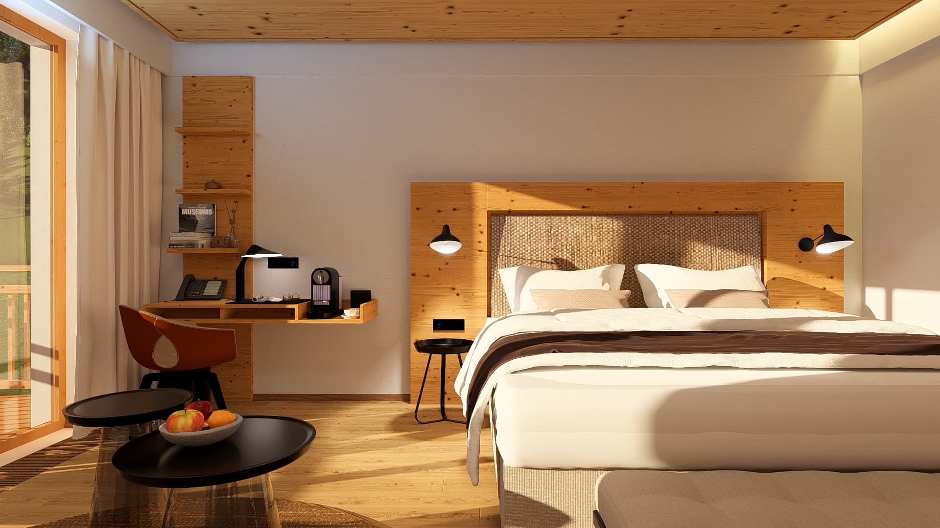 Modernes Hotelzimmer mit einem Queensize-Bett, einem Kopfteil aus Holz, einem kleinen Schreibtisch mit Kaffeemaschine und zwei runden Couchtischen mit einer Obstschale.